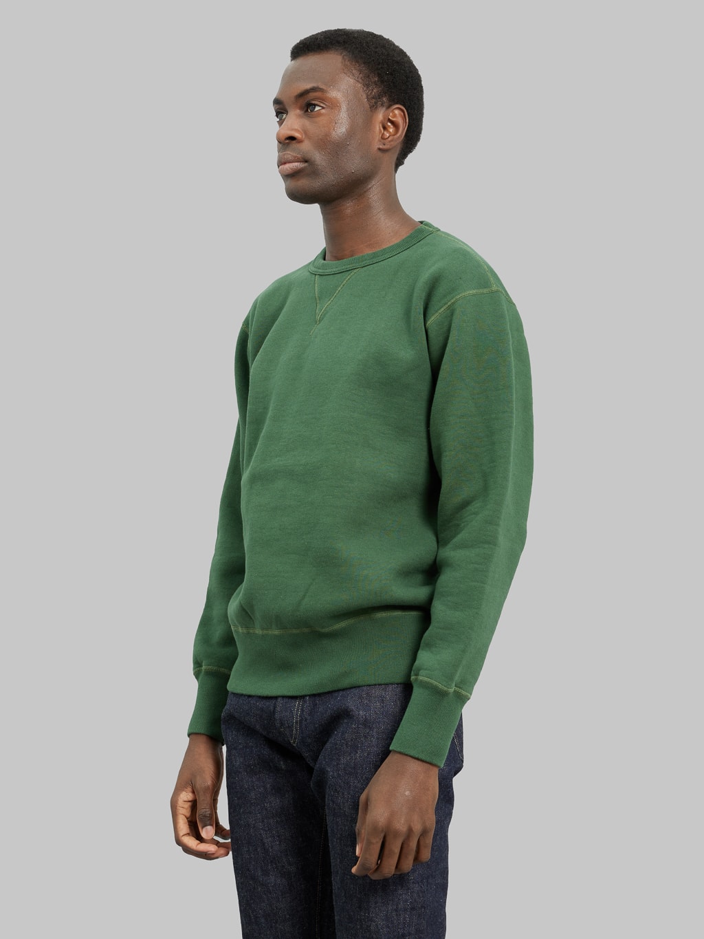 The Strike Gold Loopwheeled Sweatshirt Green model side fit