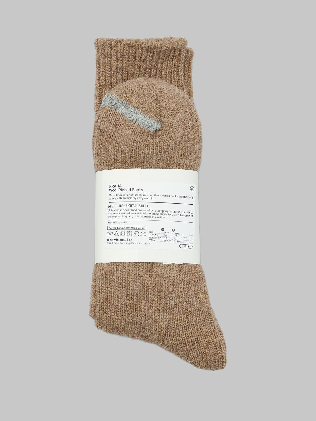 nishiguchi kutsushita praha wool ribbed socks beige back label