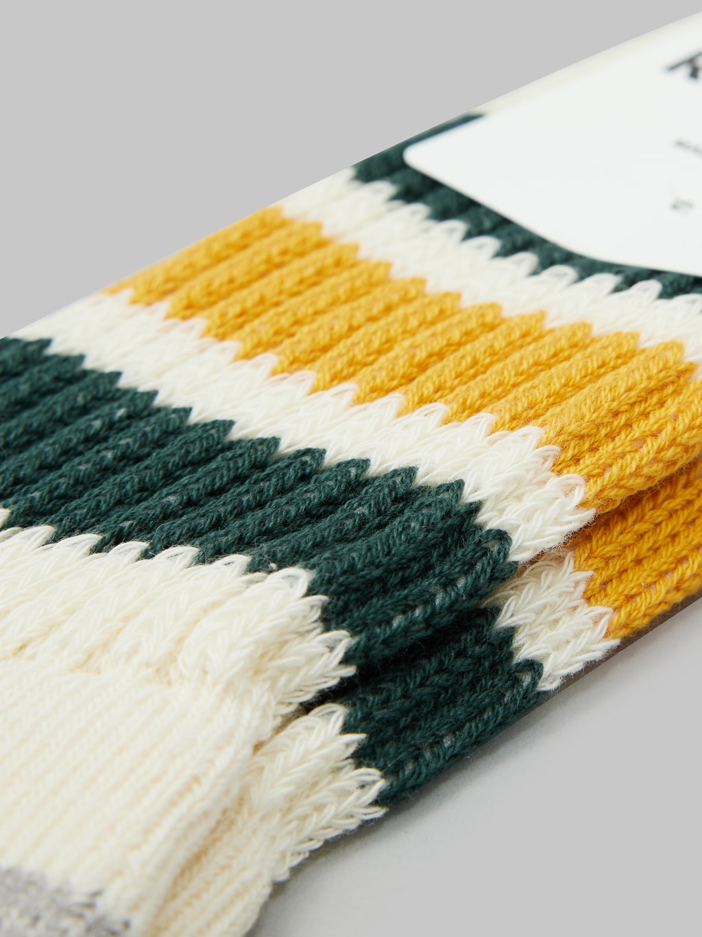 rototo coarse ribbed oldschool crew socks dark green yellow texture