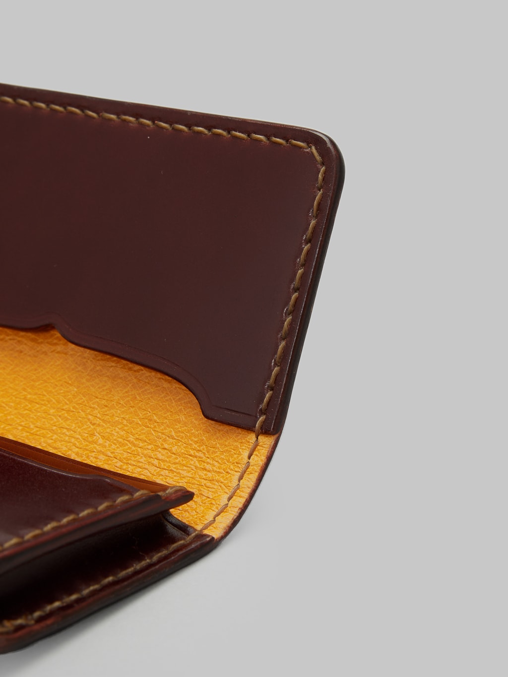 The Flat Head handsewn small cordovan card case brown yellow lining