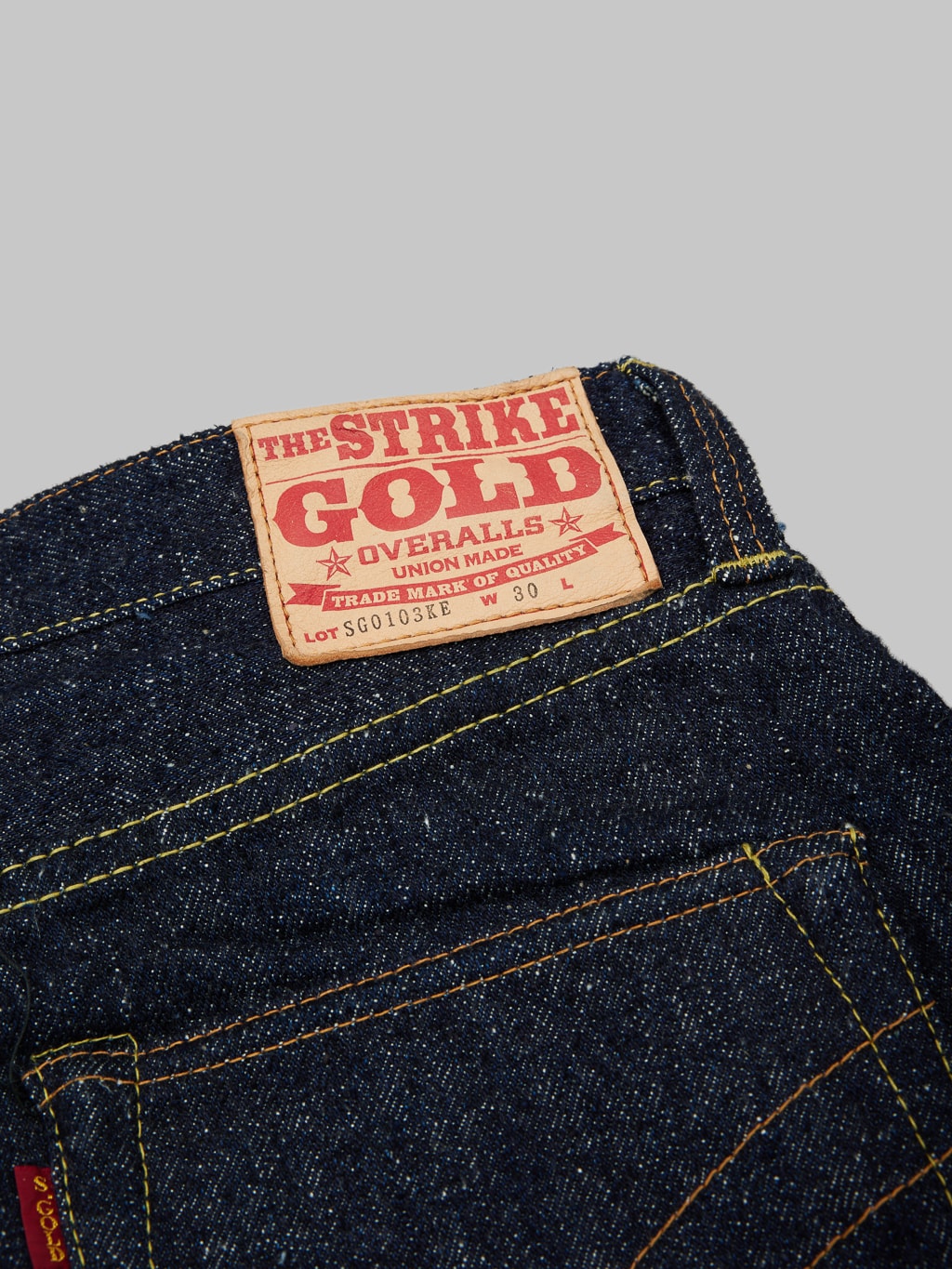 The Strike Gold 0103KE Keep Earth Jeans  leather patch