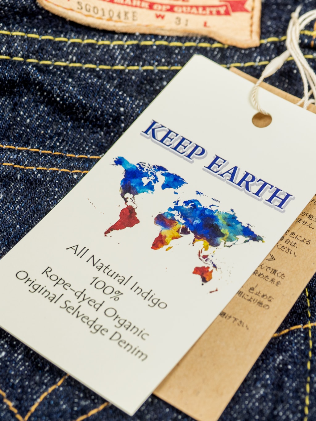 The Strike Gold Keep Earth Natural Indigo Jeans label