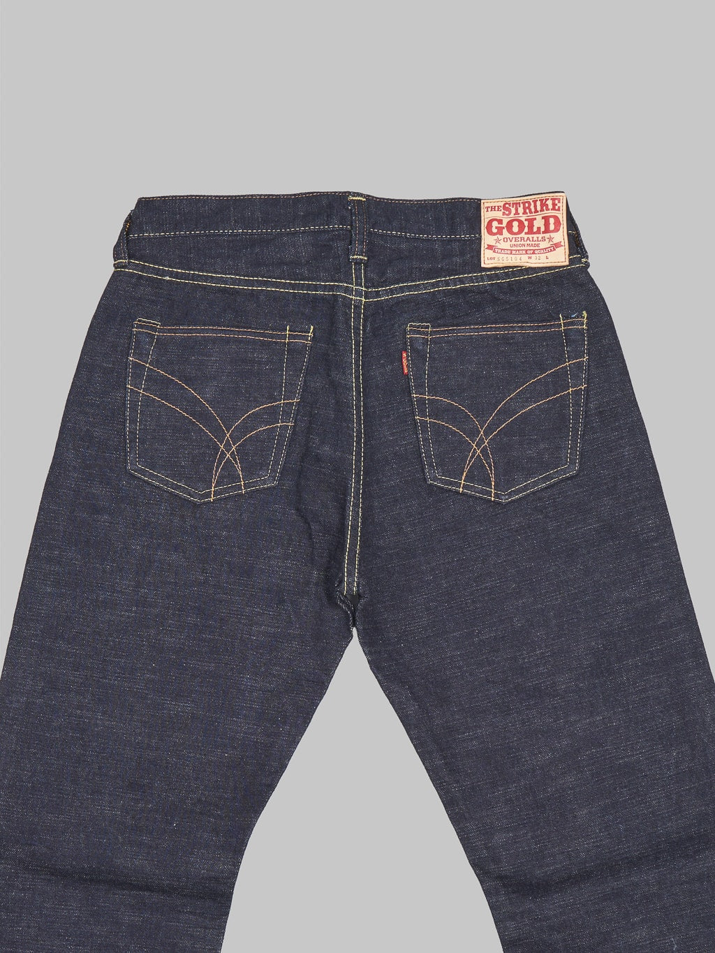 The Strike Gold 5104 Slub Grey Weft Straight Tapered Jeans back pockets