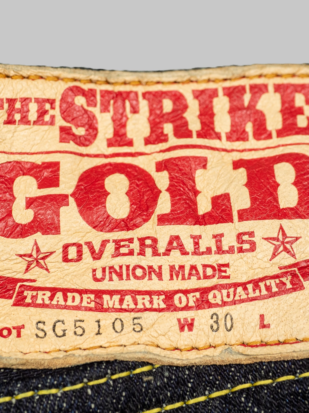 The Strike Gold Slub Weft Slim Jeans brand leather patch