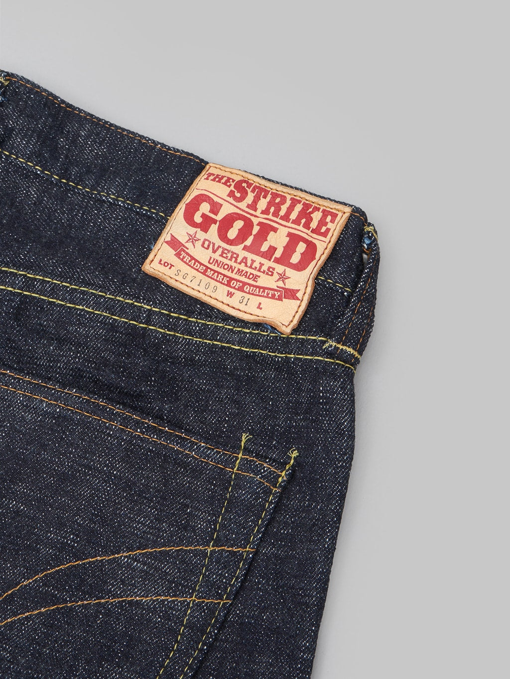 The Strike Gold 7109 Ultra Slubby Slim Tapered Jeans leather patch