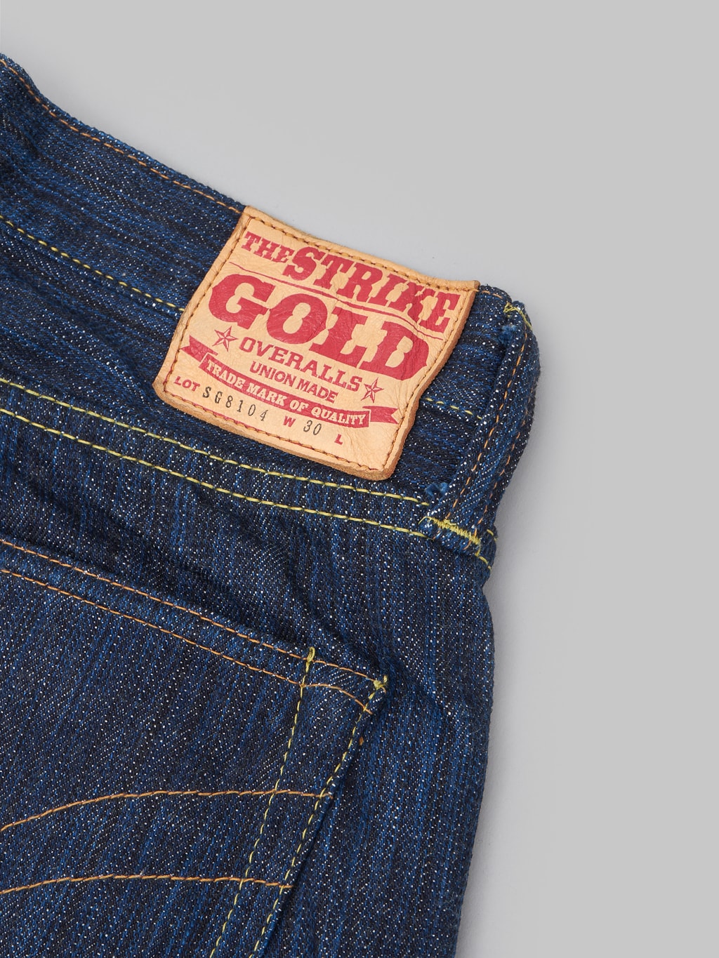 The Strike Gold 8104 Shower Slub jeans leather patch