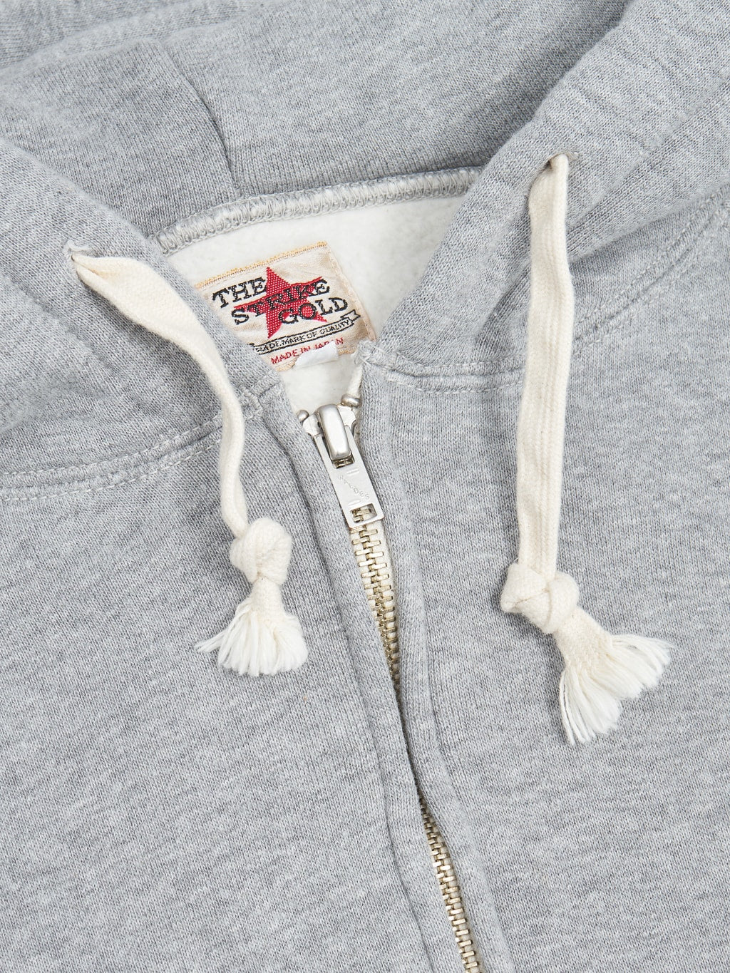 the strike gold zip hoodie grey metal zipper