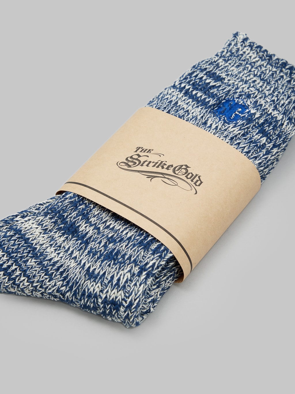 The Strike Gold Remnant Yarn Socks Blue brand label
