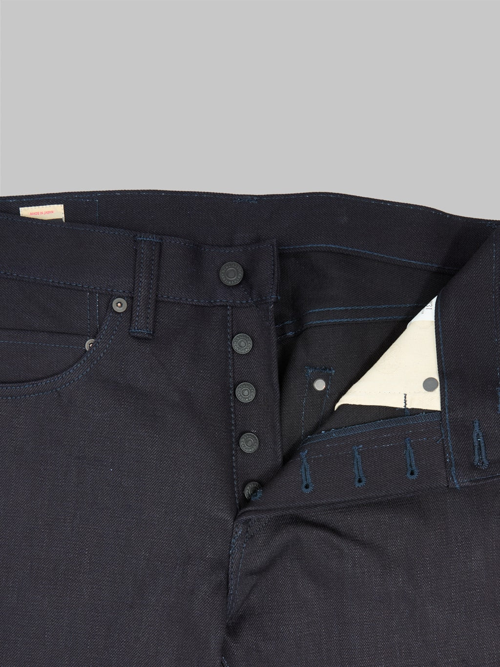 momotaro 0405 indigo x black selvedge high tapered jeans buttons