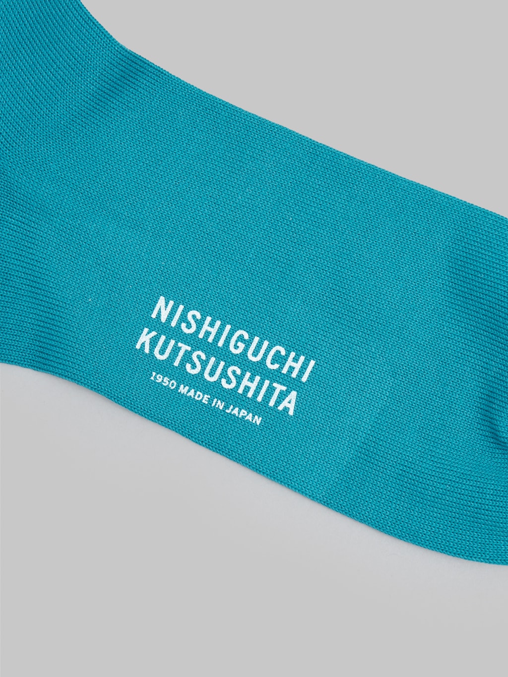 nishiguchi kutsushita egyptian cotton plain socks light aquarium blue logo