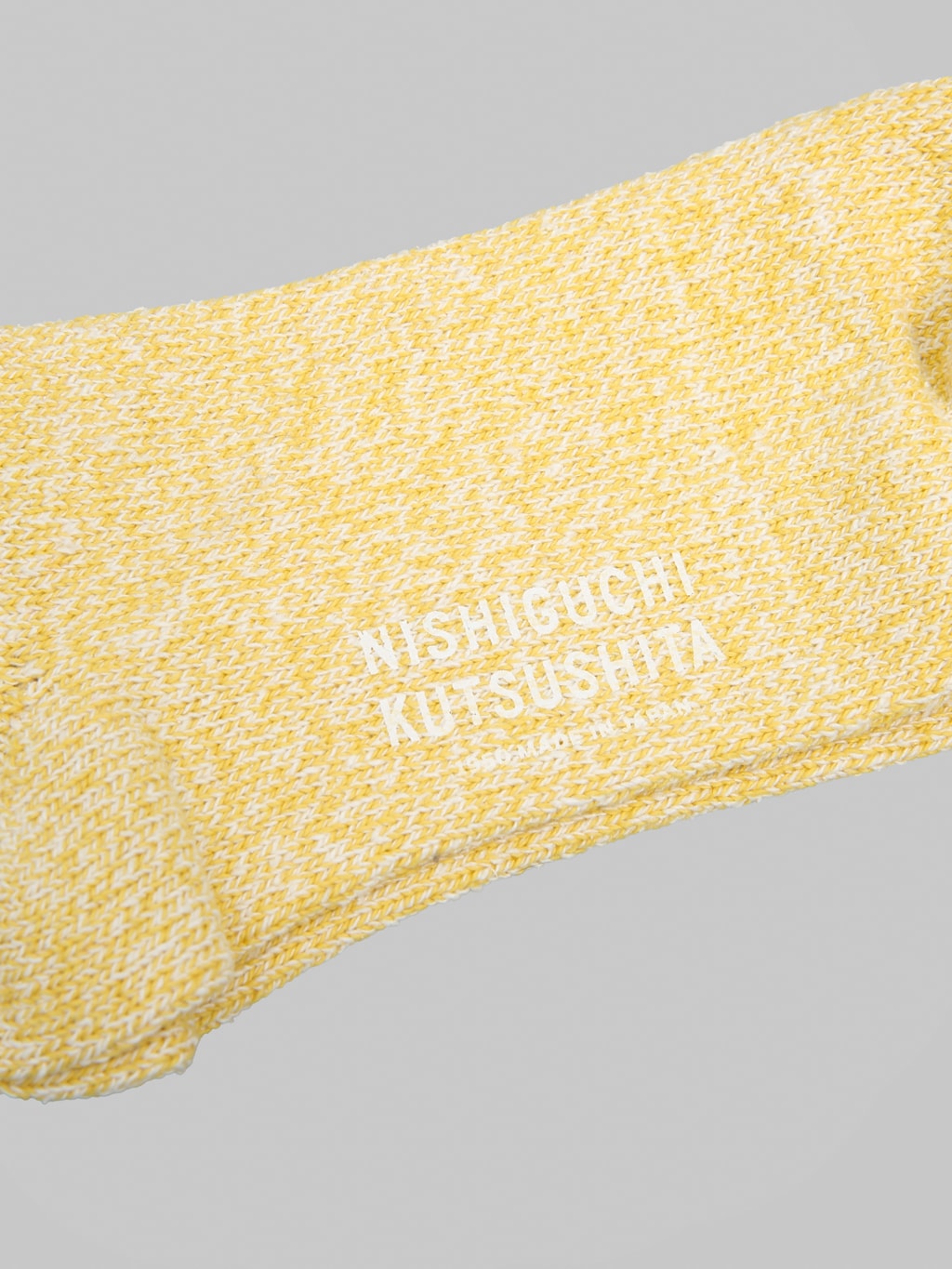 Nishiguchi  Kutsushita Silk Cotton Socks Colorful Flags logo