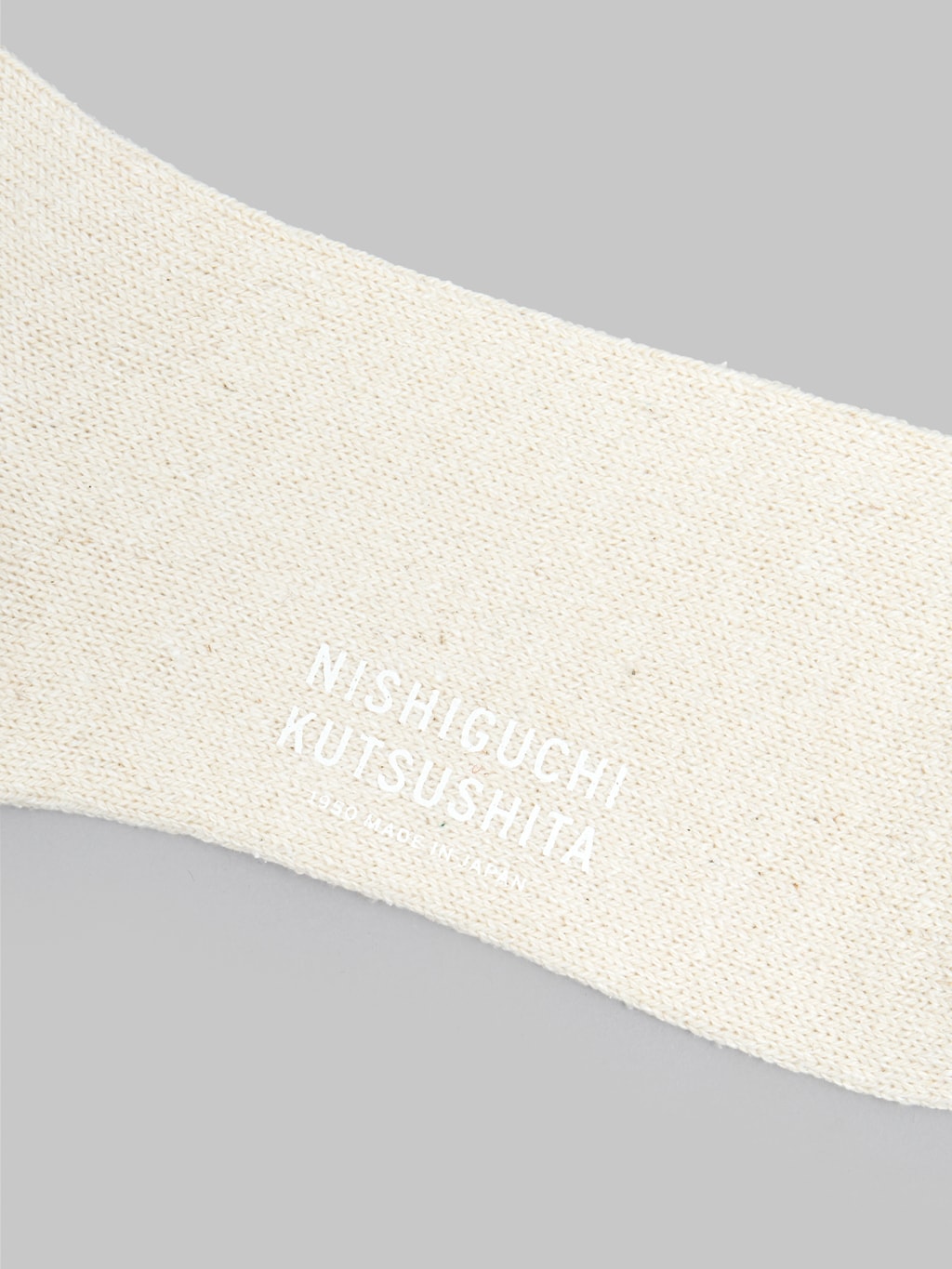 nishiguchi kutsushita silk cotton socks marshmallow cream logo