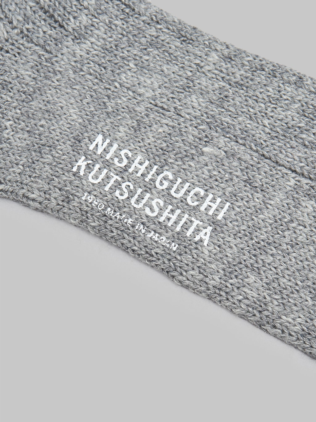Nishiguchi Kutsushita Wool Cotton Socks Charcoal Brand Logo