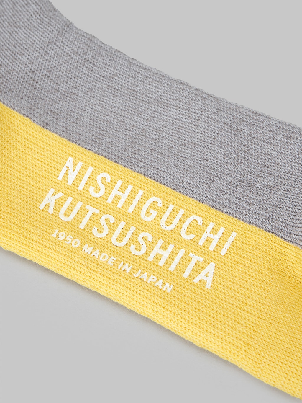 Nishiguchi Kutsushita Wool Pile Walk Socks light grey brand logo stamped