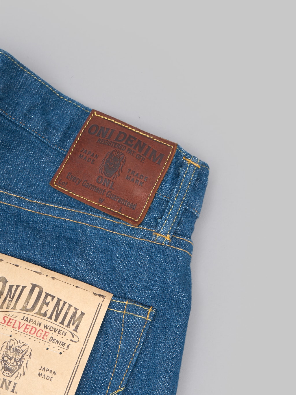 oni old faded blue denim classic straight jeans leather patch