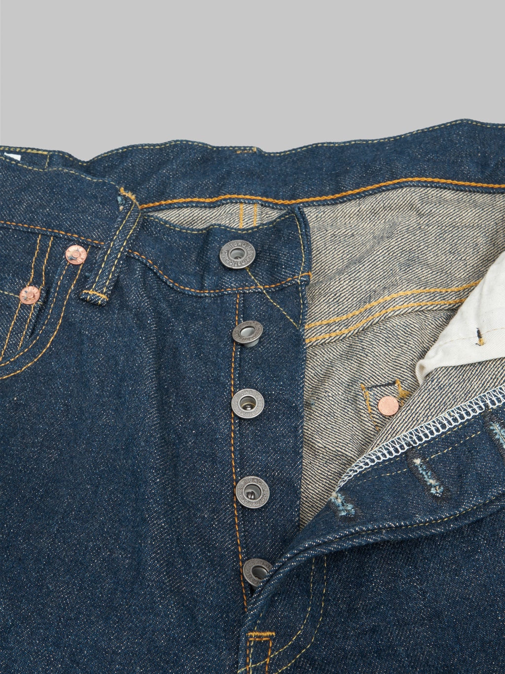 oni denim 200 ishikawadai 15oz wide straight selvedge jeans buttons closeup