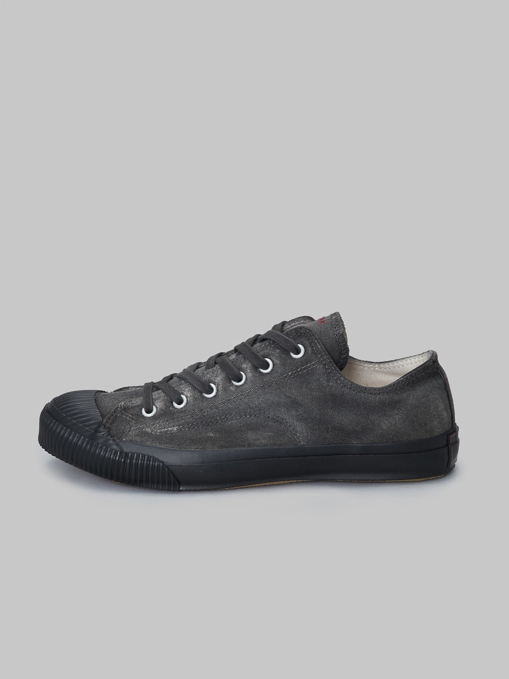 pras low shellcap sumi hand dyed black sneakers