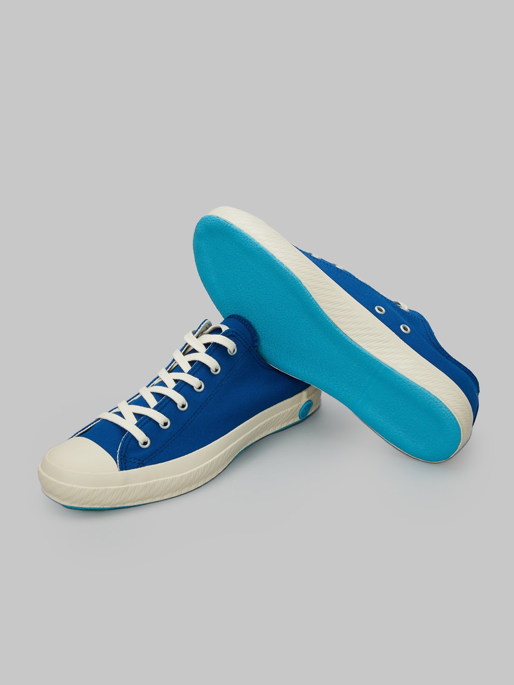 Shoes like pottery low sneaker indigo vulcanized soles