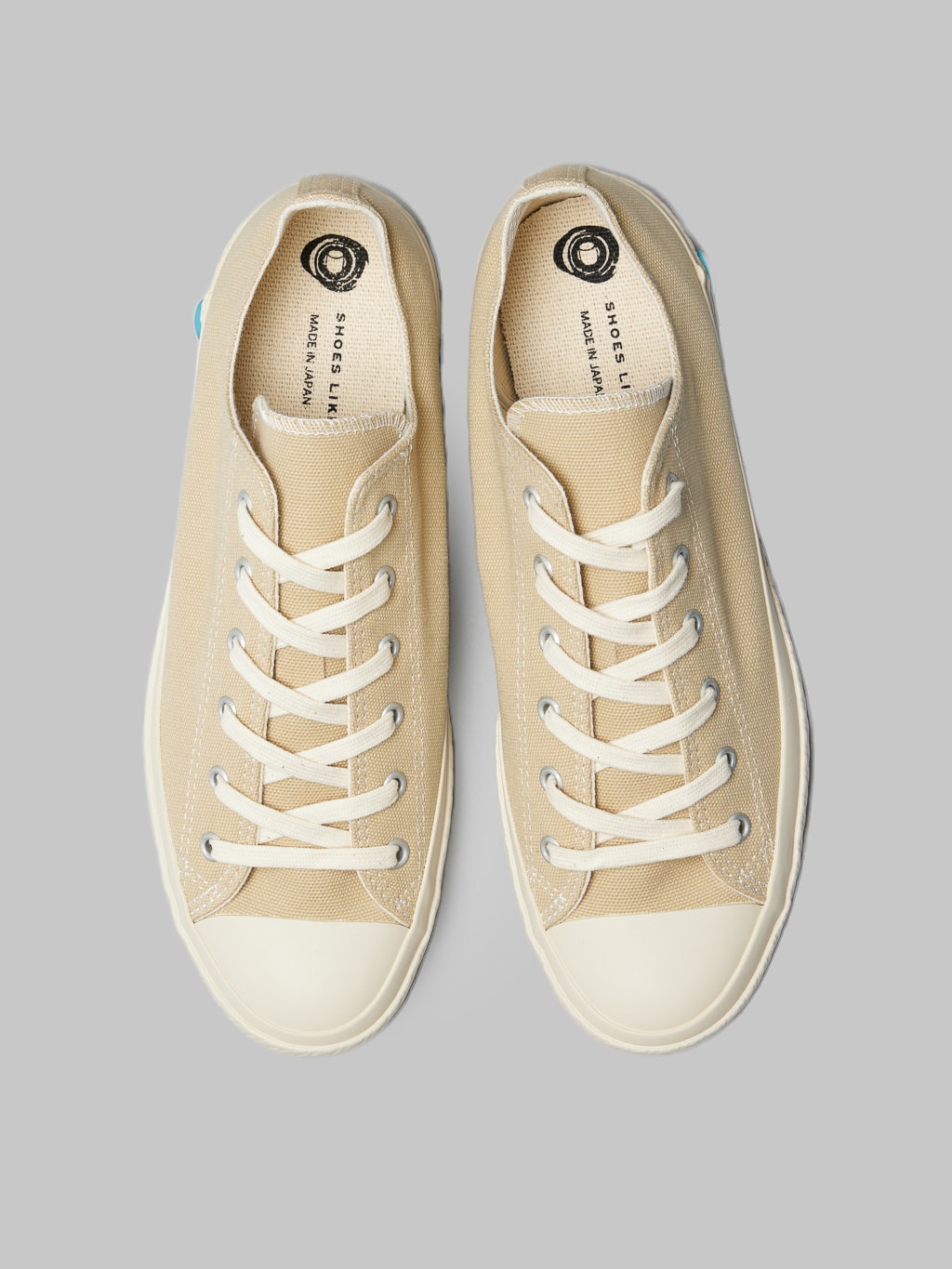 Shoes like pottery low beige sneakers up view