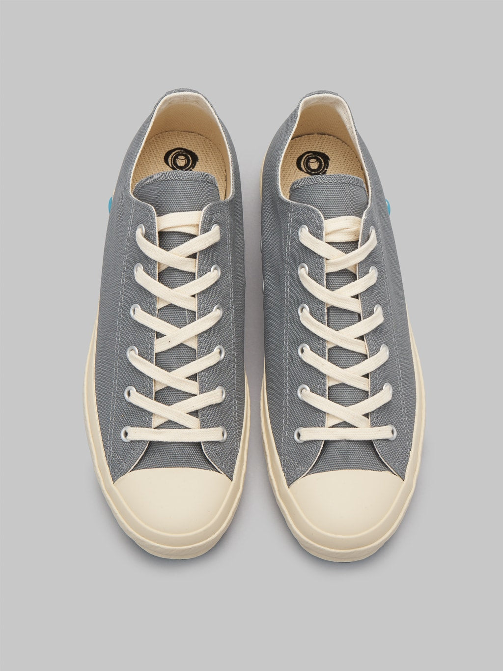 Shoes like pottery low grey sneakers up view