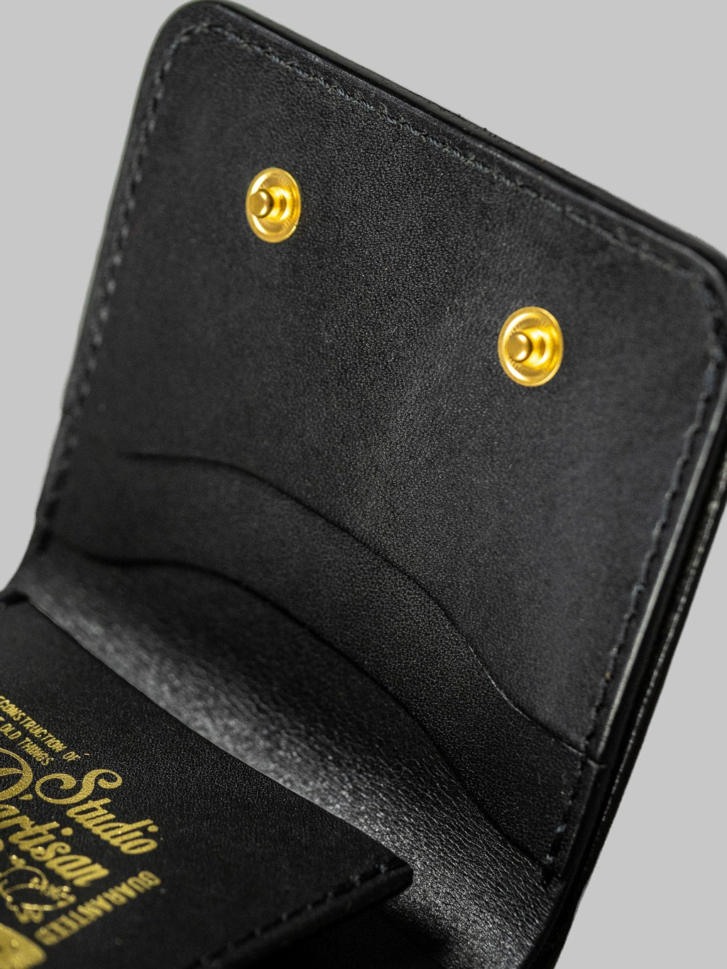 Studio Dartisan black leather mini wallet button detail