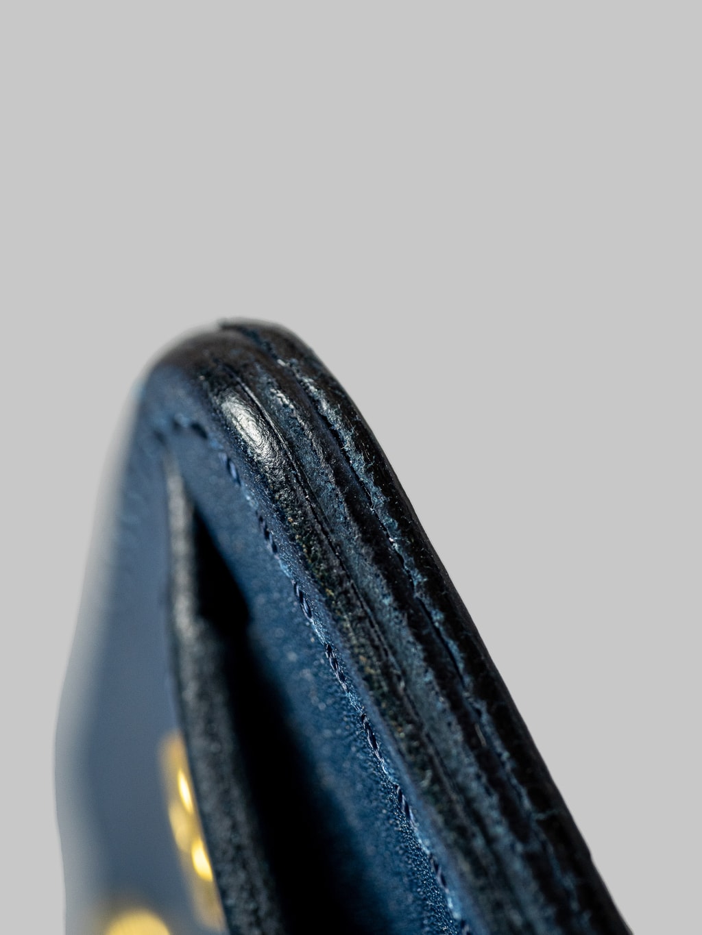 Studio Dartisan indigo leather mini wallet stitching detail