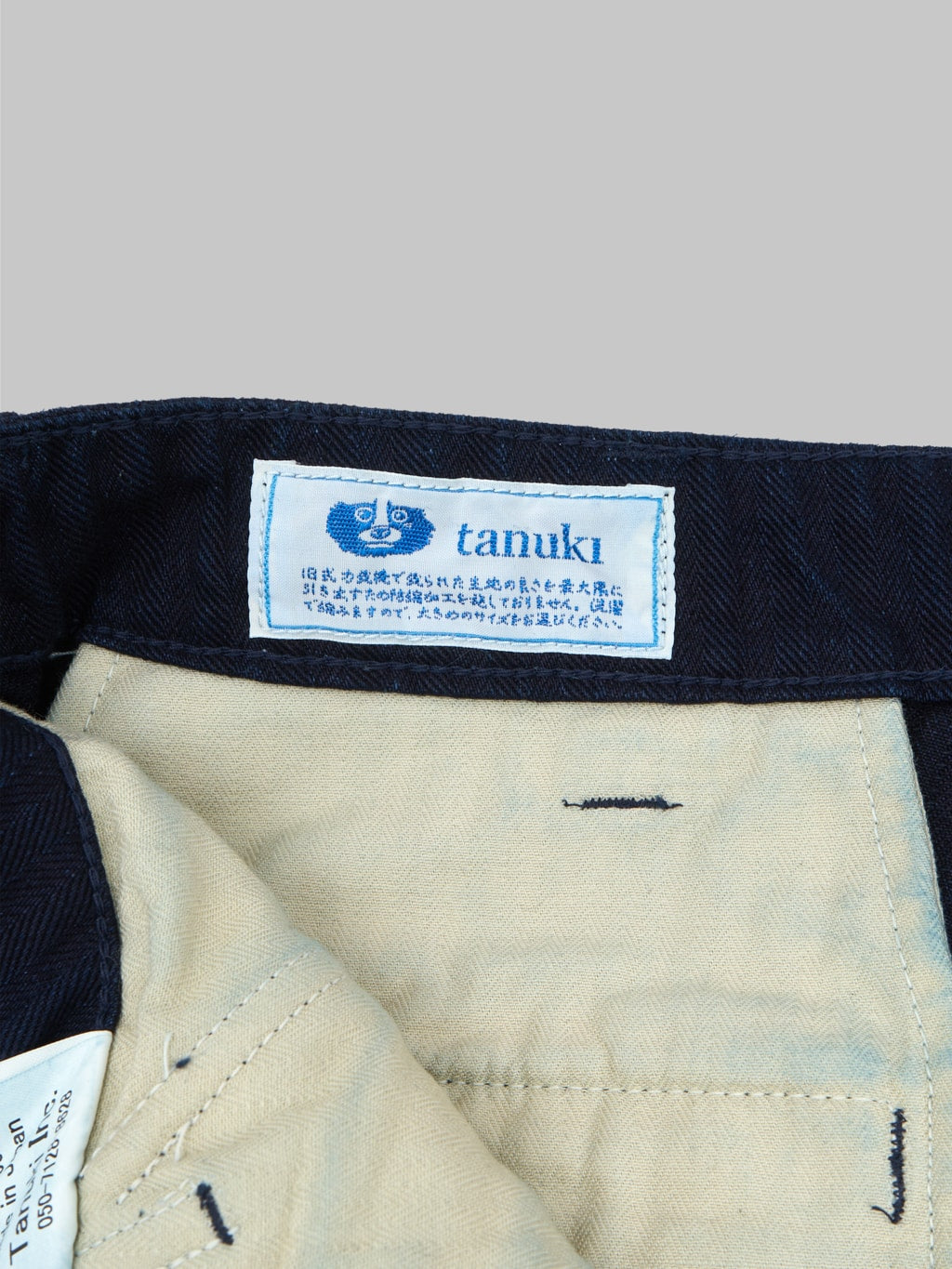 tanuki herringbone m65 pants indigo interior label