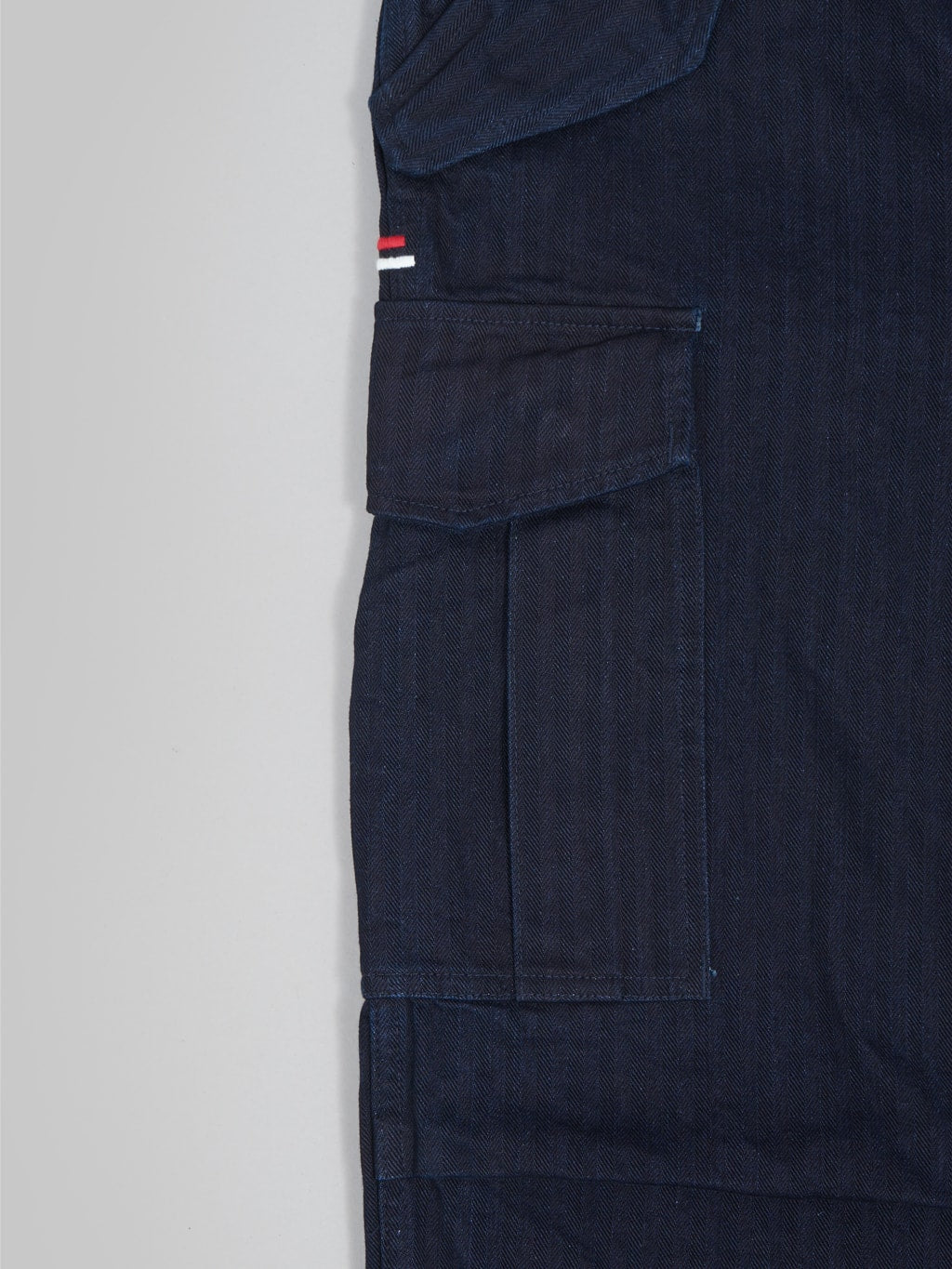 tanuki herringbone m65 pants indigo side flap snap pocket