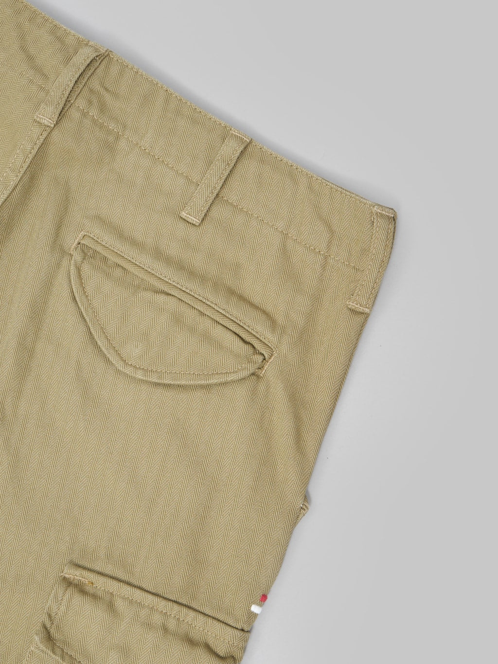 tanuki herringbone m65 pants khaki beige back pocket closeup