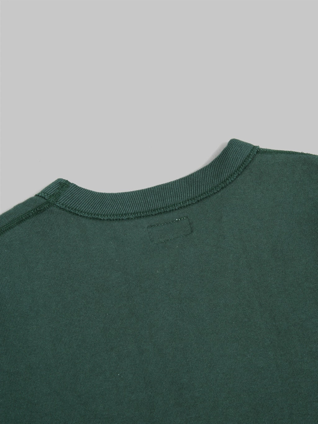 the flat head loopwheel crewneck sweatshirt engine green back collar