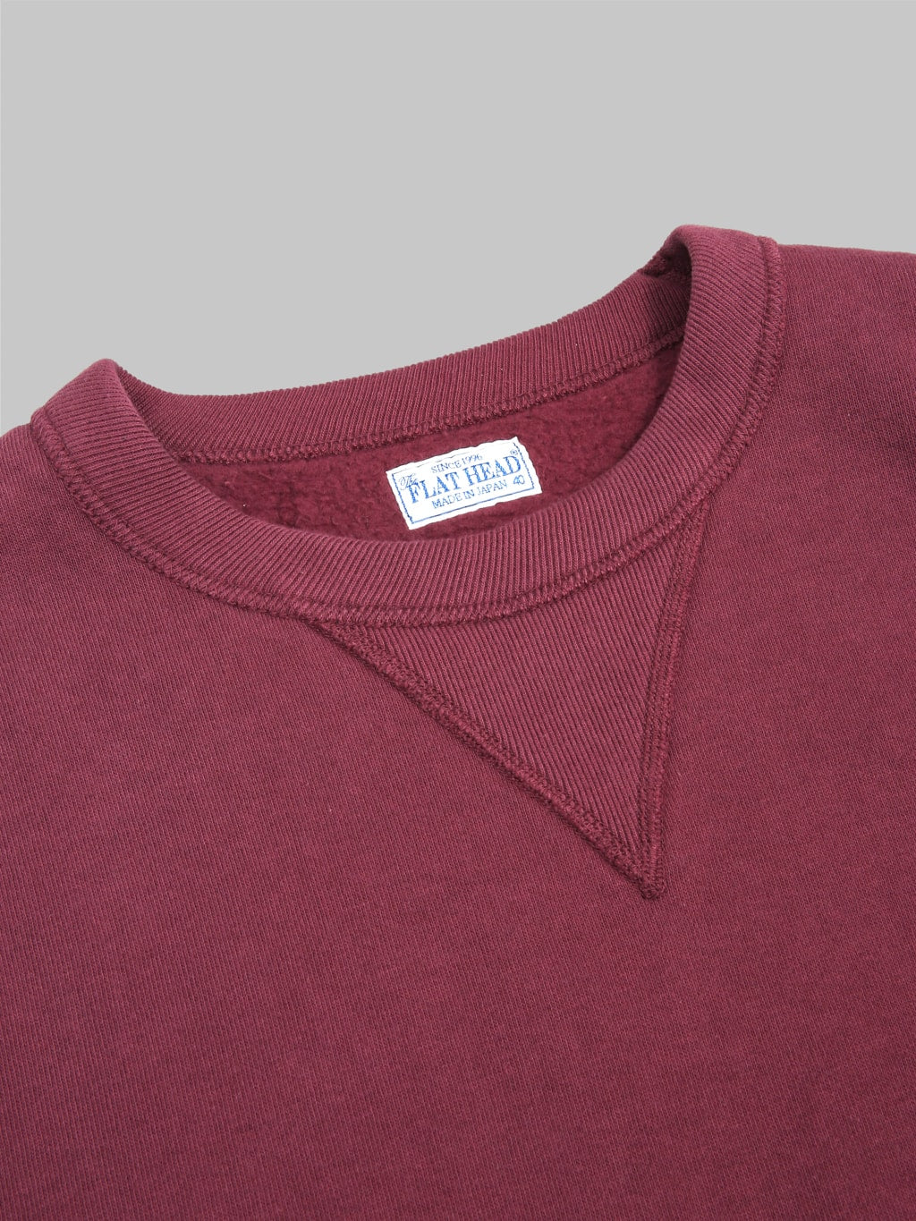 the flat head loopwheel crewneck sweatshirt engine red interior tag