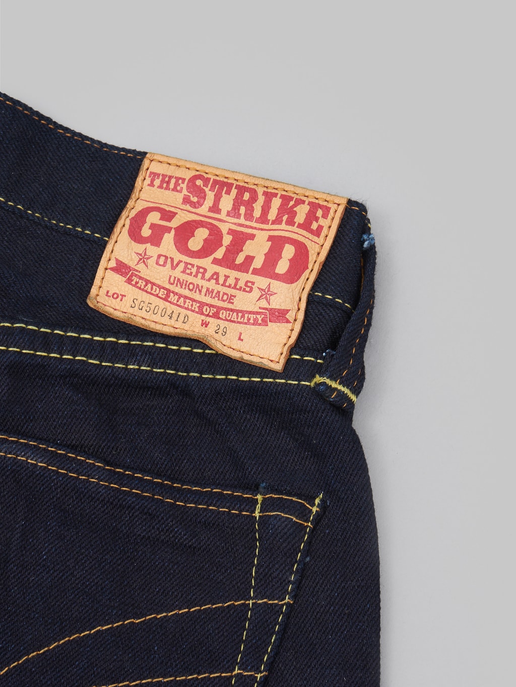 The Strike Gold 5004ID double indigo selvedge jeans leather patch