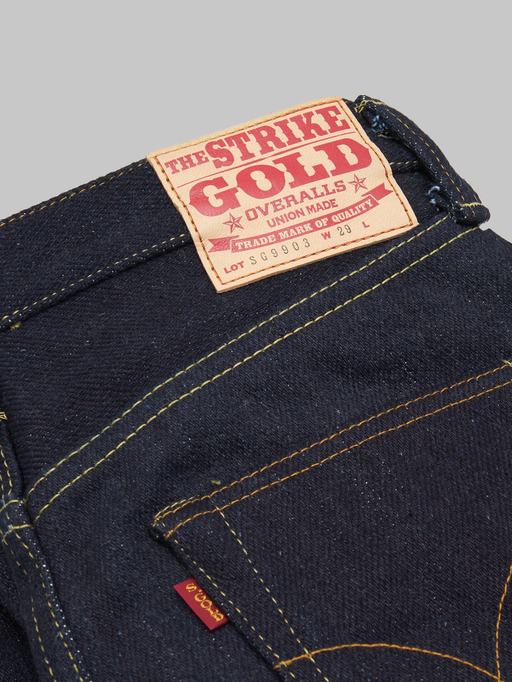 The Strike Gold Extra Heavyweight regular straight jeans brand red tab