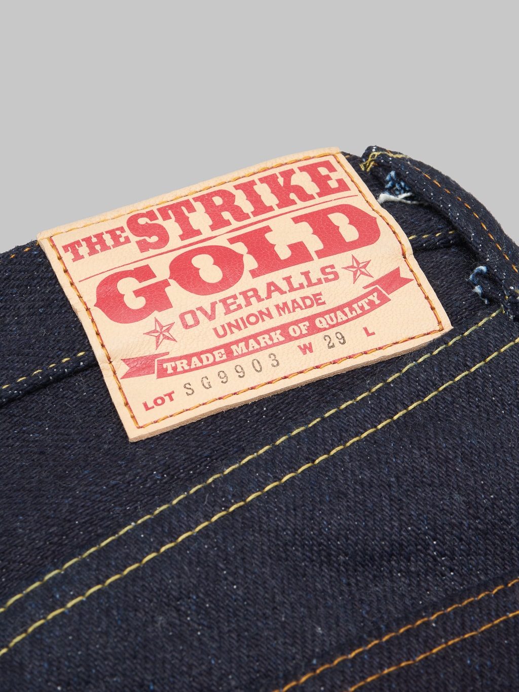 The Strike Gold Extra Heavyweight regular straight jeans brand patch