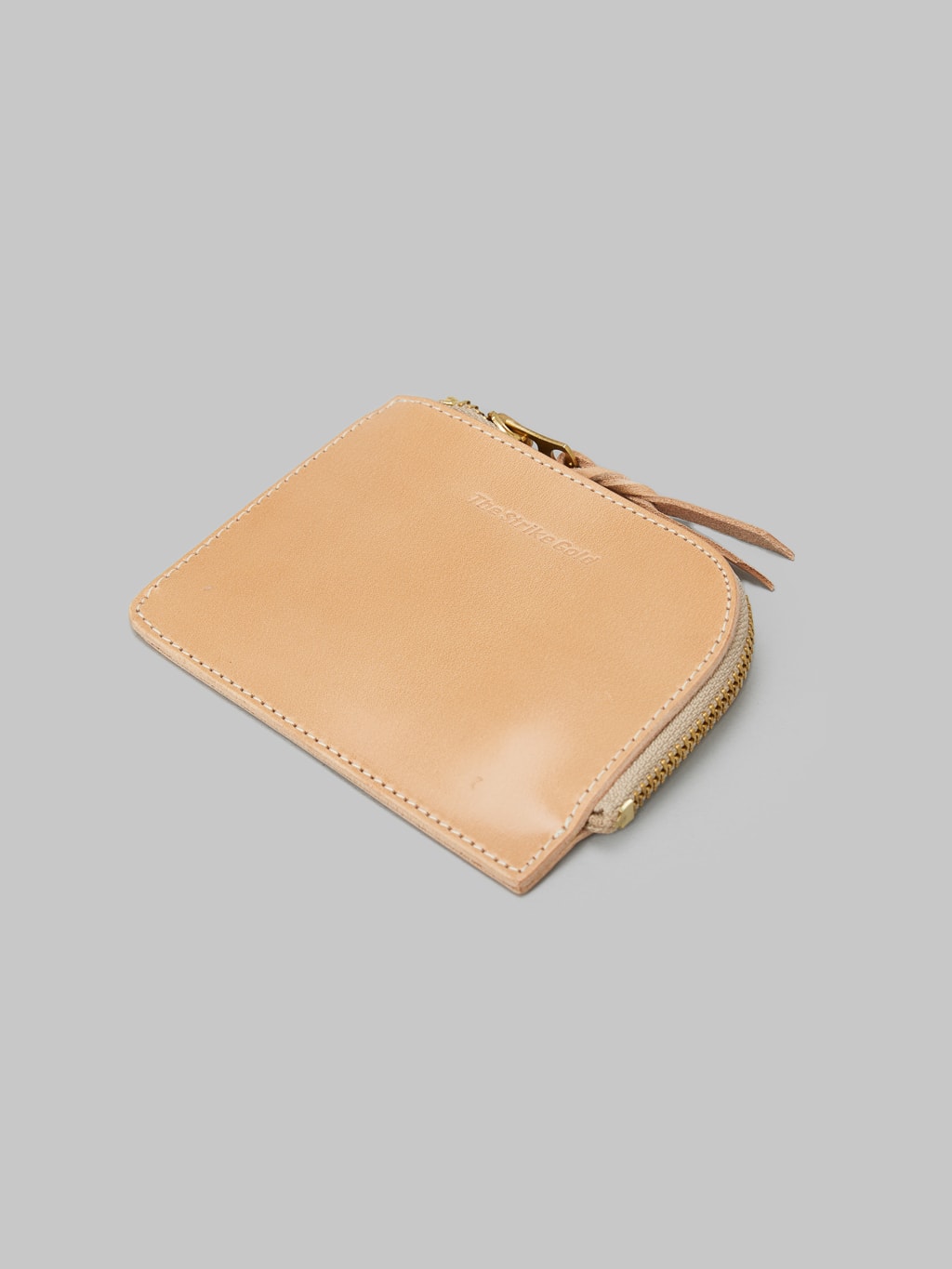 The Strike Gold Leather Zip Wallet Natural front view