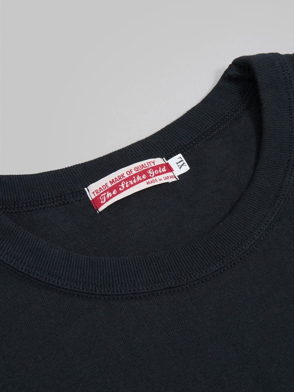 the strike gold loopwheel tshirt black collar closeup