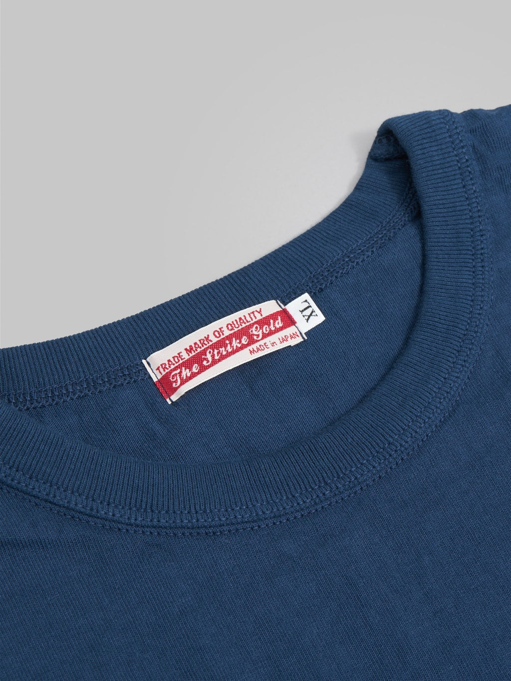 the strike gold loopwheel tshirt navy  collar