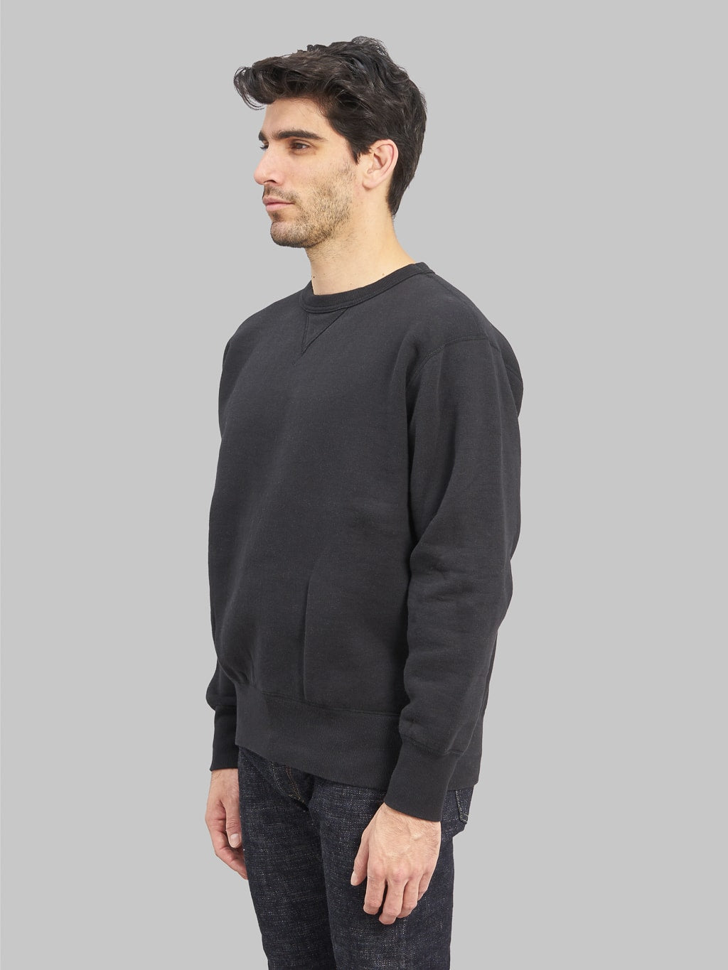 The Strike Gold Loopwheeled Sweatshirt black model side fit
