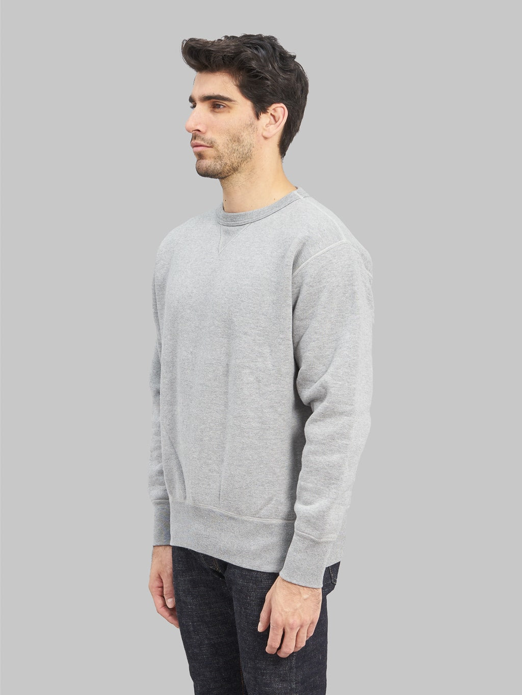 The Strike Gold Loopwheeled Sweatshirt grey model side fit