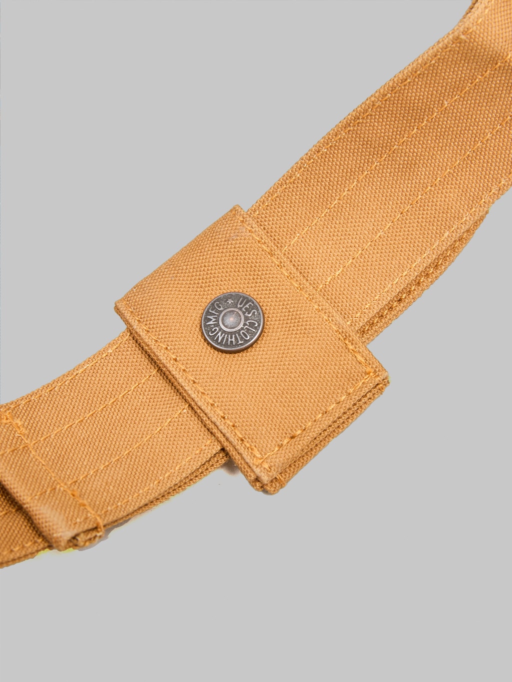 UES Body Bag Denim brand logo