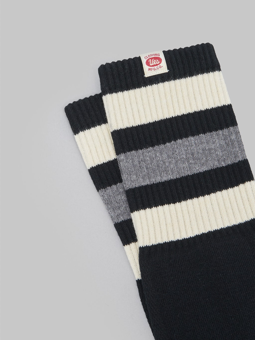 UES boot socks black stripes logo tag