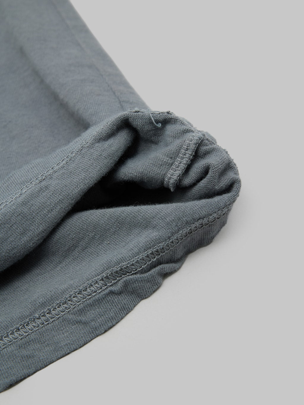 ues logo tshirt grey slim fit vintage fabric closeup