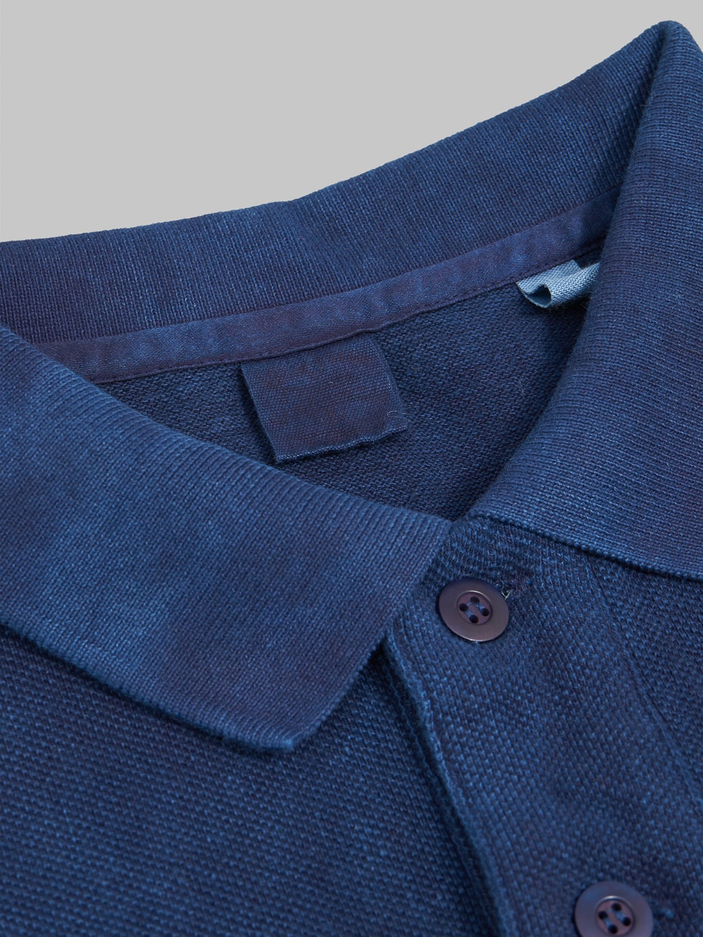 ues polo shirt indigo weft fabric detail