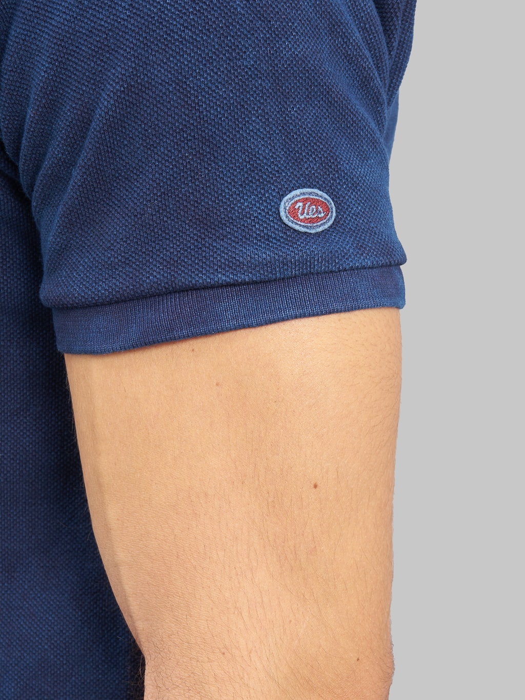 ues polo shirt indigo brand logo sleeve