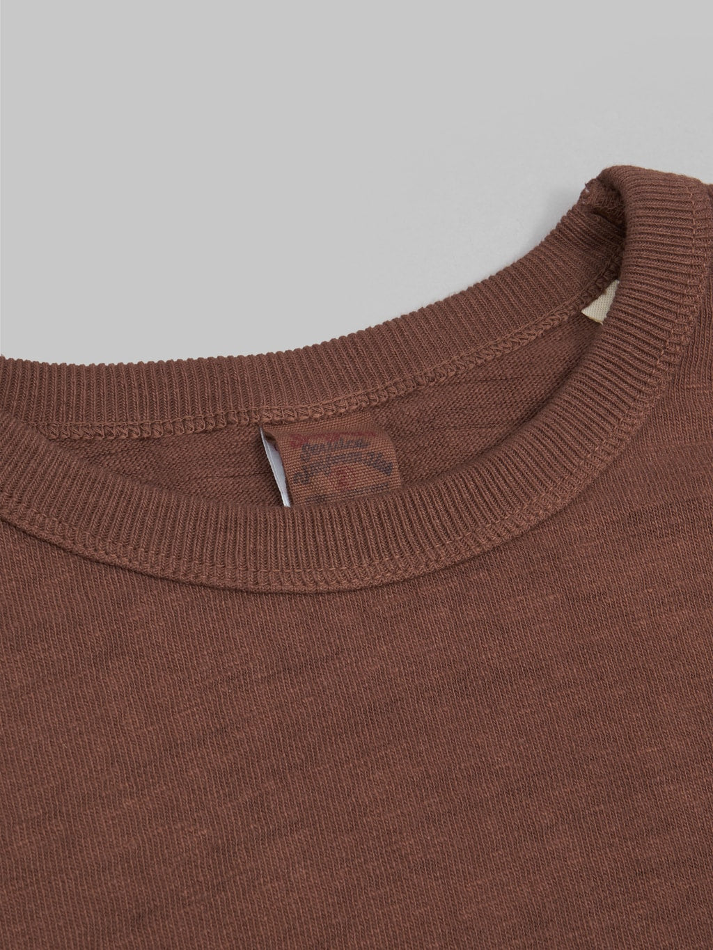 ues slub nep long sleeve tshirt brown collar closeup