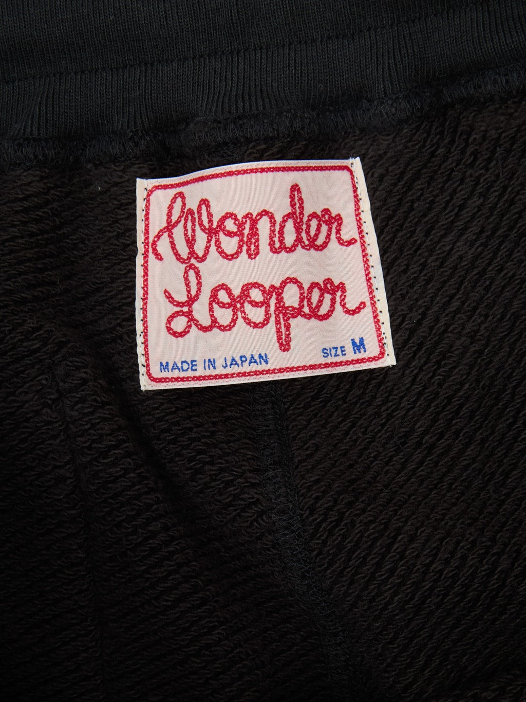 wonder looper double heavyweight french terry sweatpants sumi black interior tag