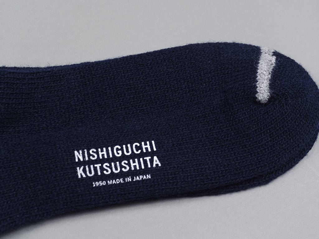 Nishiguchi Kutsushita Praha wool ribbed socks navy stamped logo