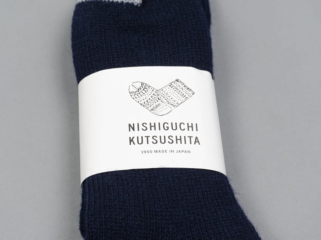 Nishiguchi Kutsushita Praha wool ribbed socks navy brand label