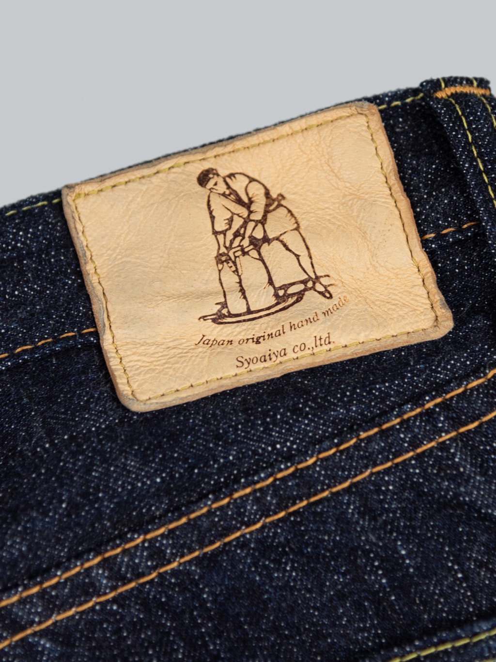 Pure Blue Japan Relaxed Tapered denim jeans brand leather patch