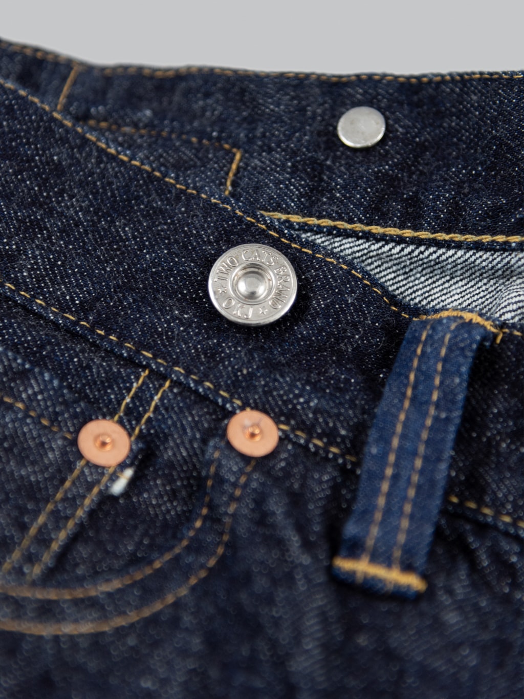TCB 20s indigo Jeans one wash vintage style cinchbeck button closeup